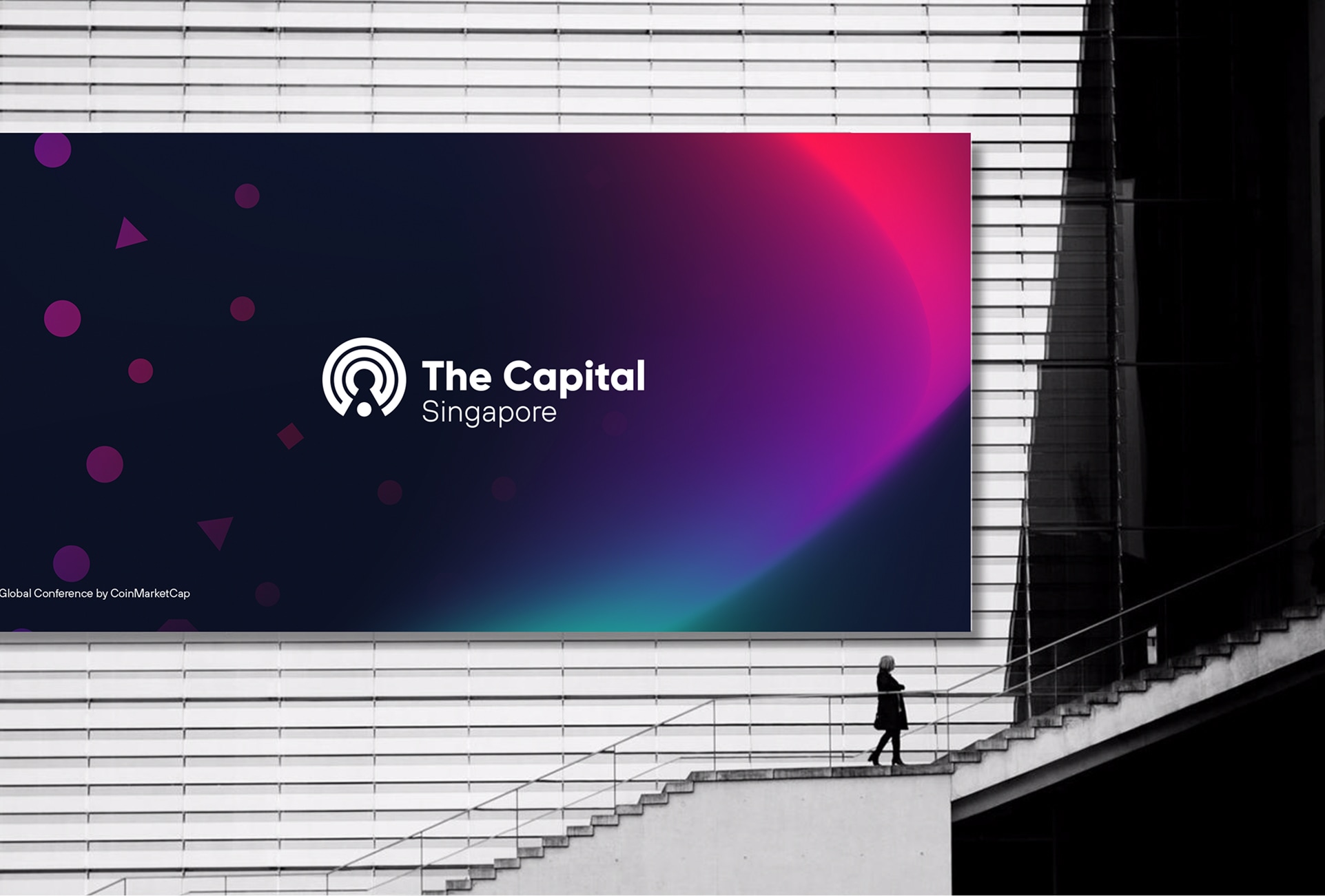 The Capital banner above a staircase
